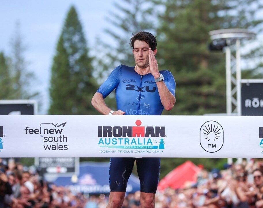 Steve-McKenna-taking-the-win-at-IRONMAN-Australia-2023-robot-pose