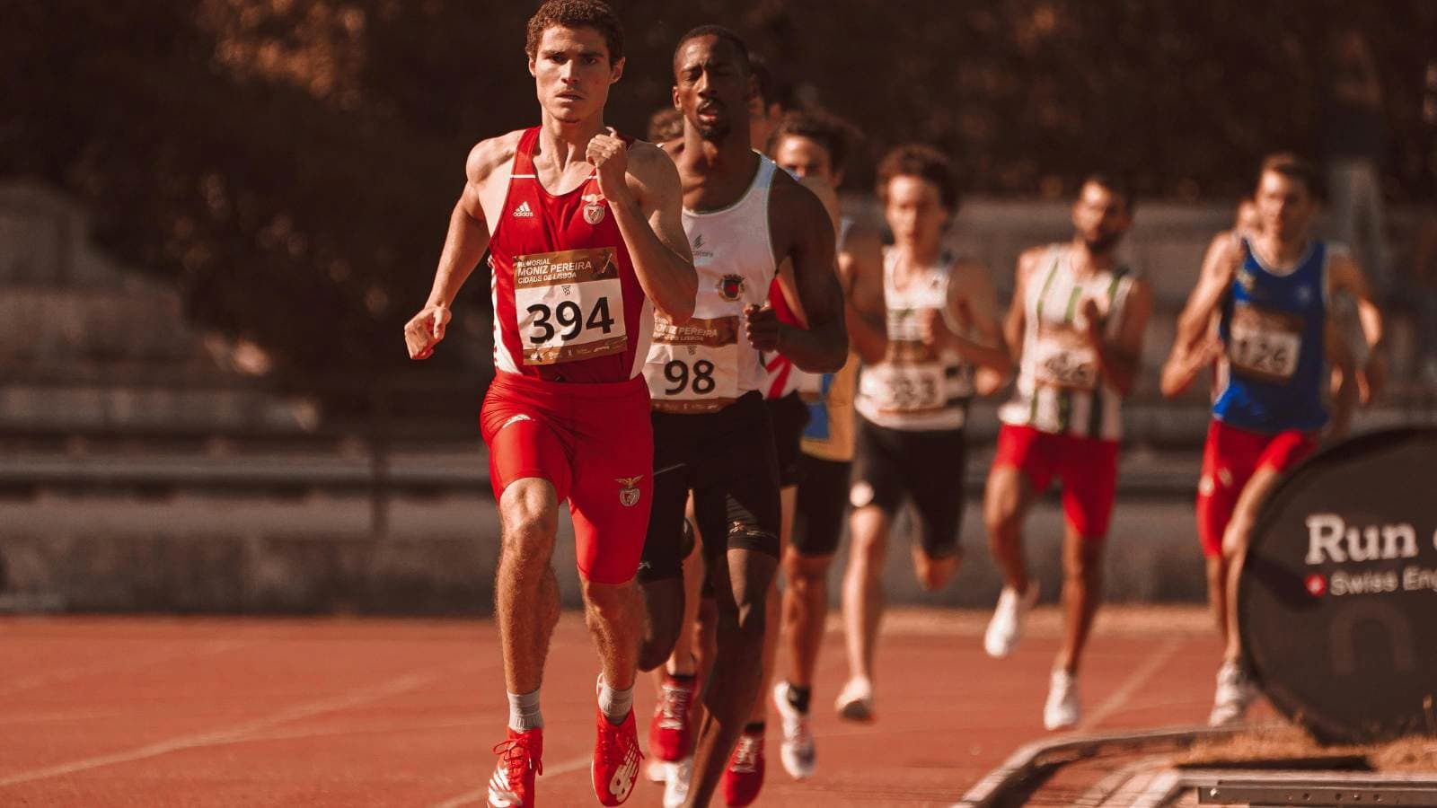 Group of marathon runners racing on the road, demonstrating endurance, pacing, and energy management to prevent bonking