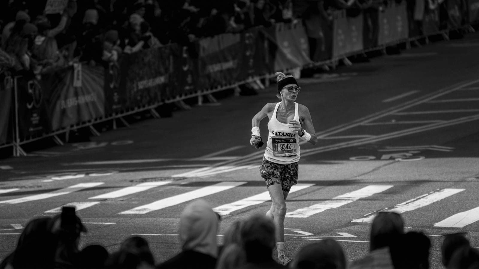 athlete running with proper cadence and technique to enhance efficiency and reduce injury risk