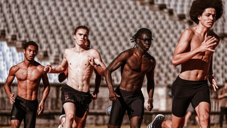 runner demonstrating proper running form with strong hip movement and efficient stride mechanics