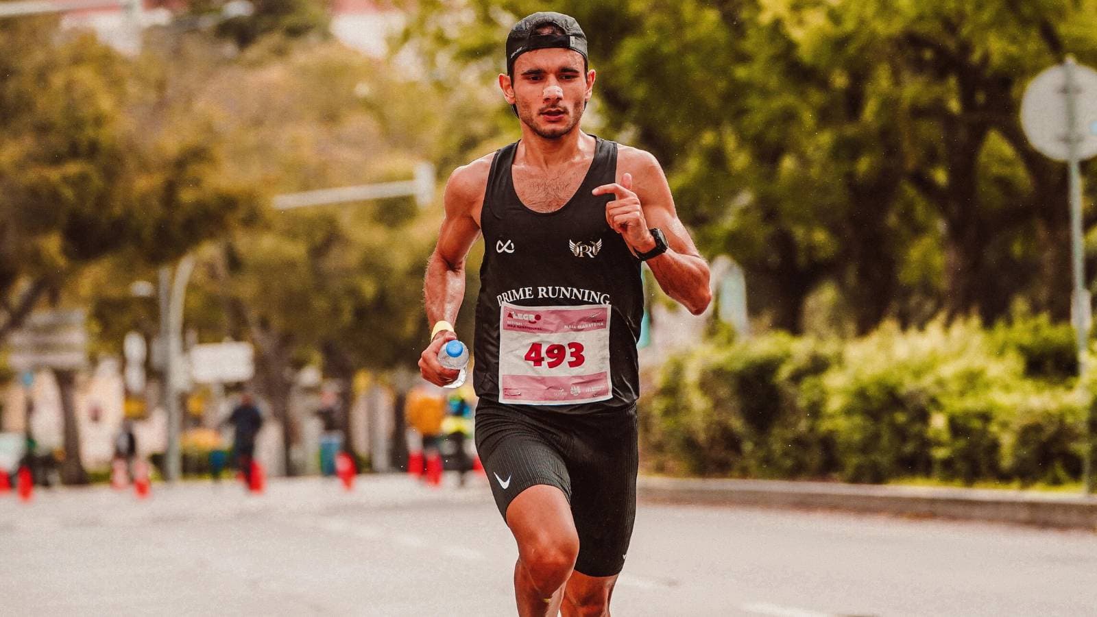 runner preparing race nutrition plan for different distances including 5k 10k half marathon and marathon