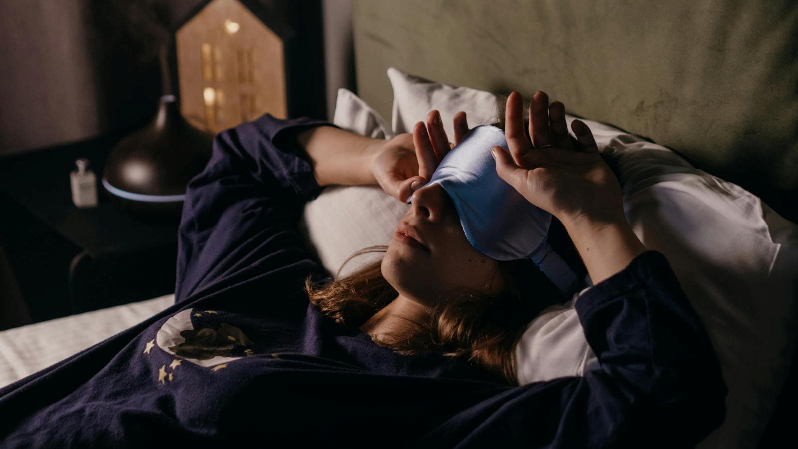 runner resting and recovering after training highlighting importance of sleep for muscle recovery