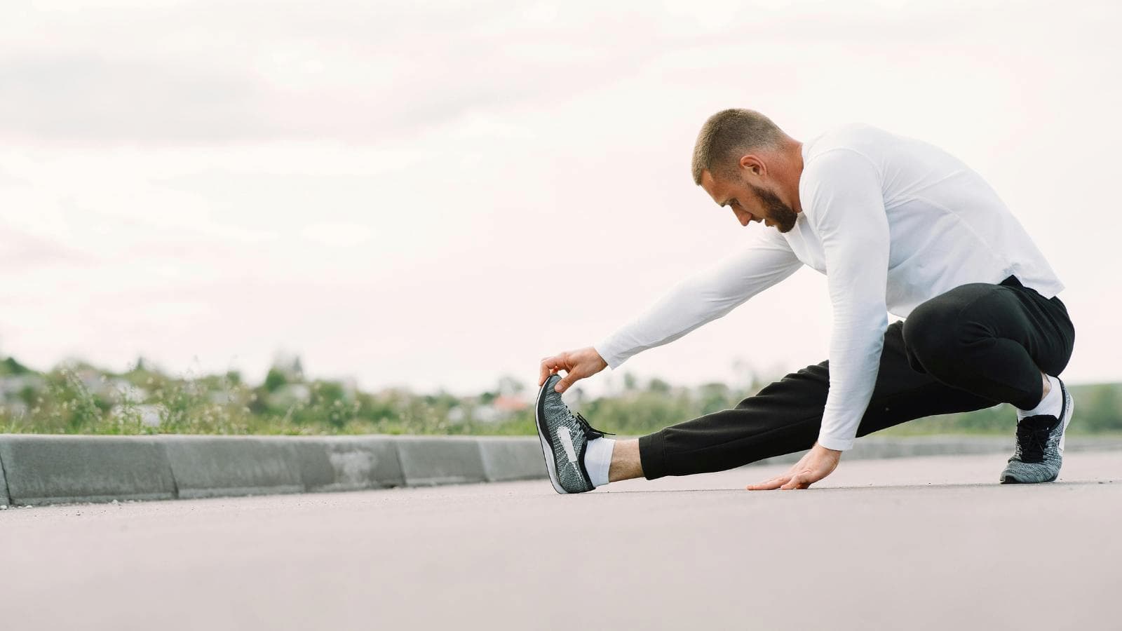 runner performing daily mobility exercises to improve flexibility and running performance