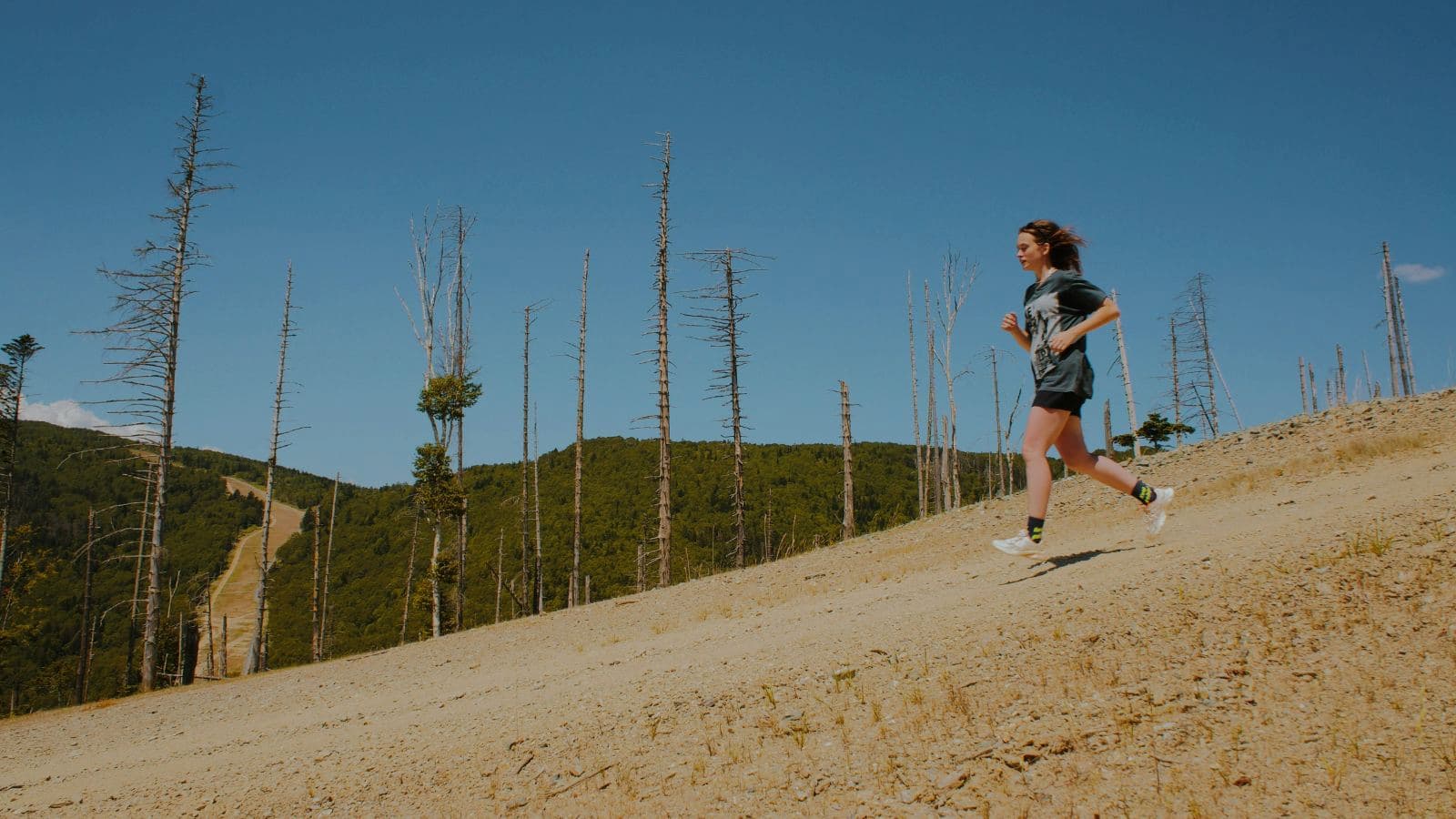runner recovering and stretching on rest day during marathon training program
