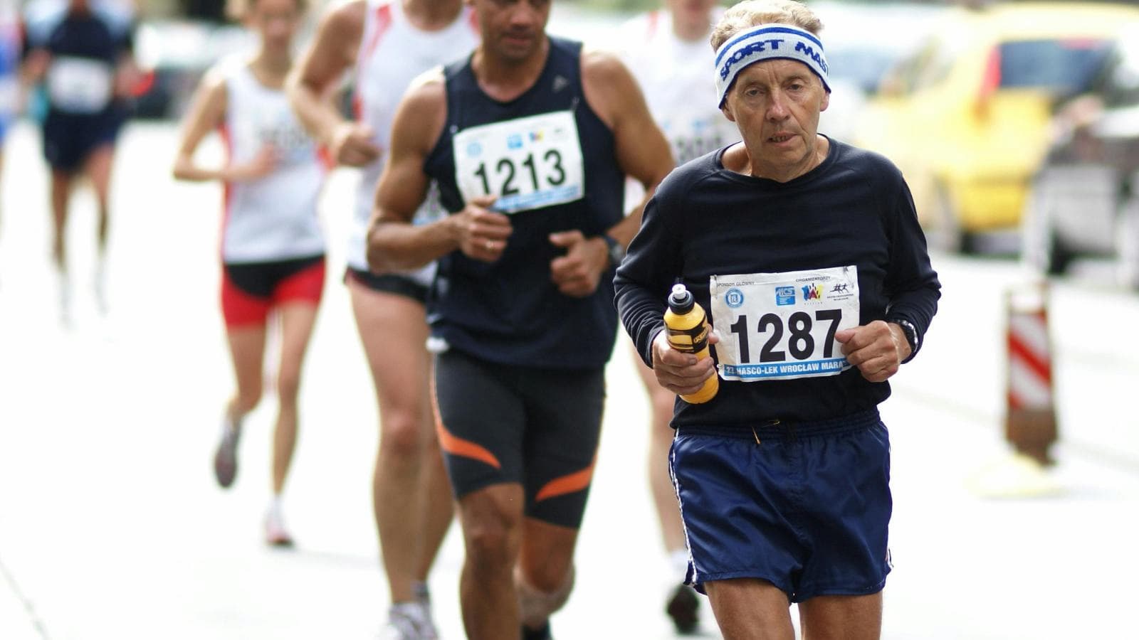 runner hydrating and preparing balanced pre race meals during final week of marathon taper