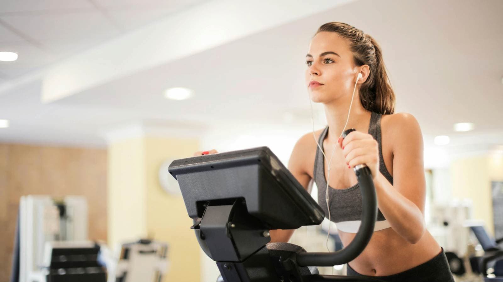 runner tracking marathon training progress and increasing workload for endurance development
