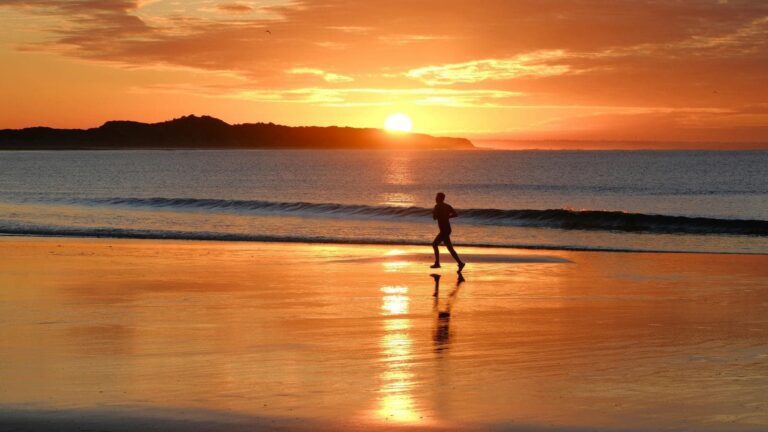 marathon runner training early in the morning to improve endurance and race performance