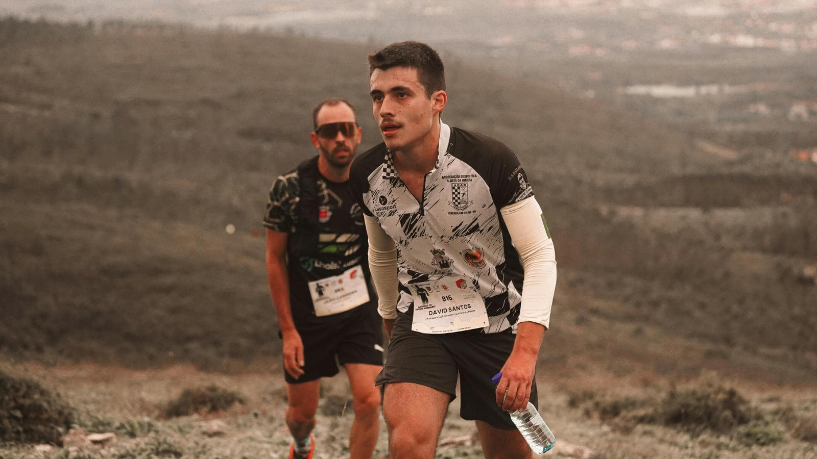 fatigued marathon runner overtraining without rest days during intense training schedule