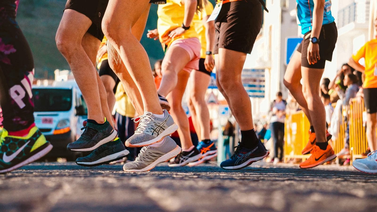 marathon runner demonstrating efficient footstrike technique during long distance race