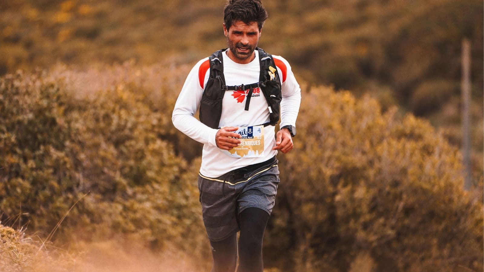 trail runner performing hill workout to build strength and speed for trail racing