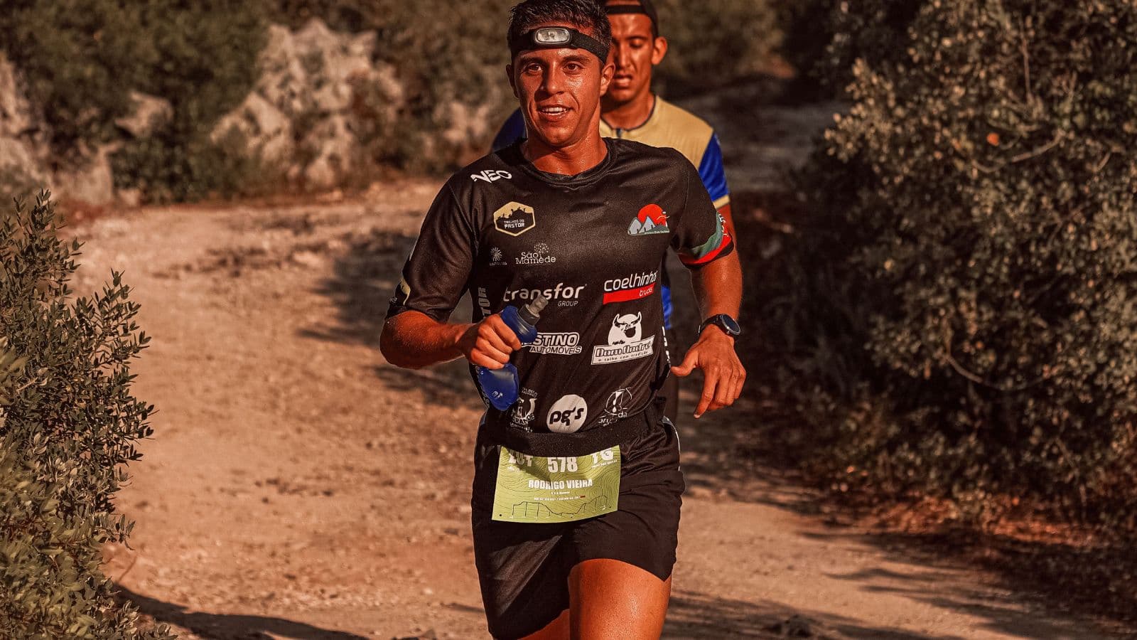 trail runner training on mountain trails to build endurance for long distance trail running