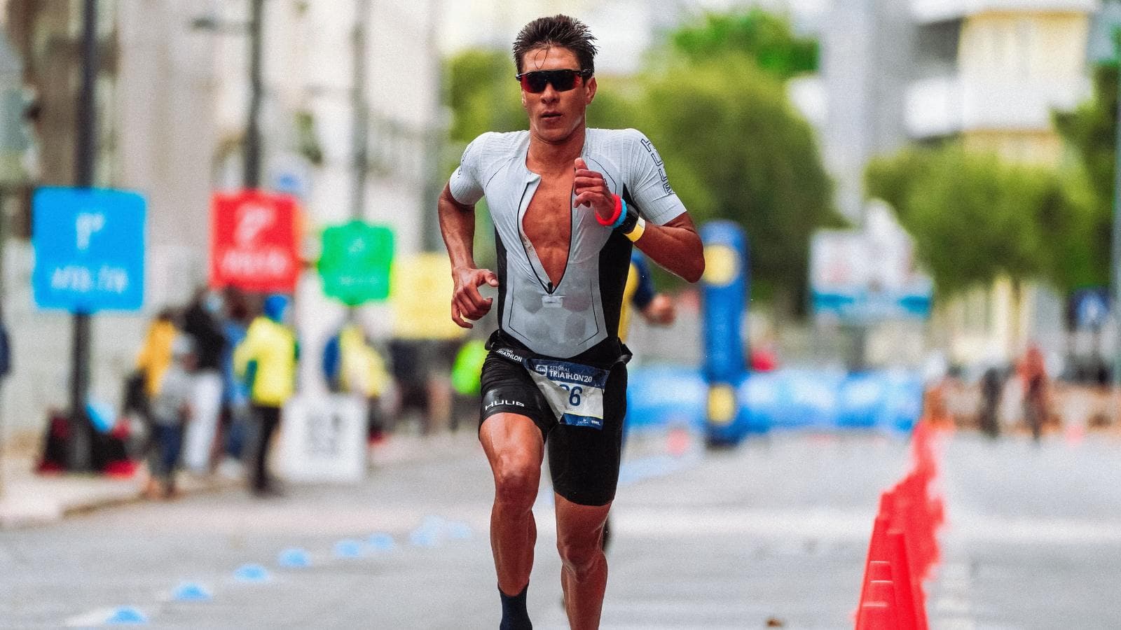 distance runner demonstrating effective arm swing mechanics during outdoor running session