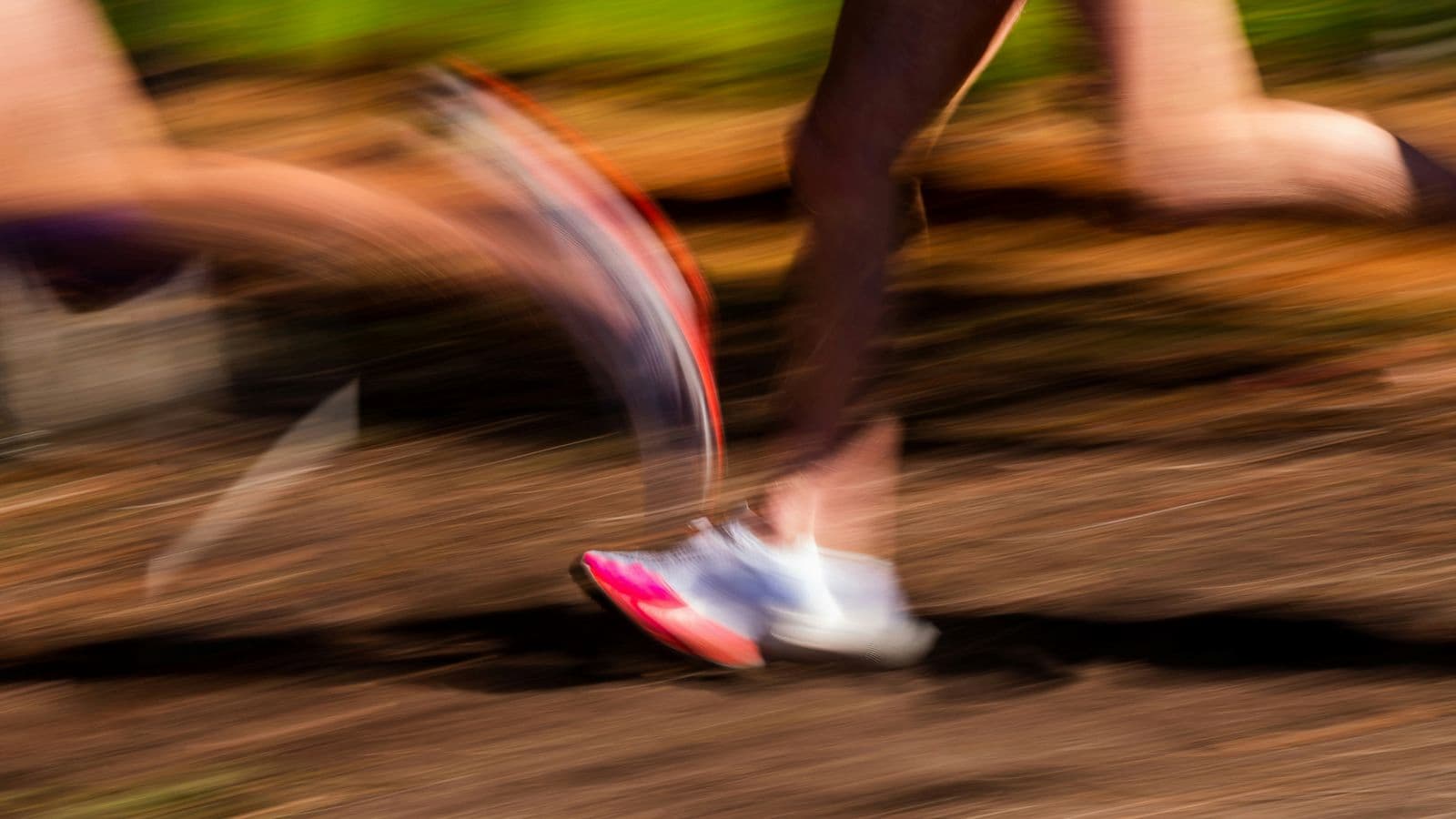 trail runner experiencing injury caused by muscle imbalance during technical trail running session