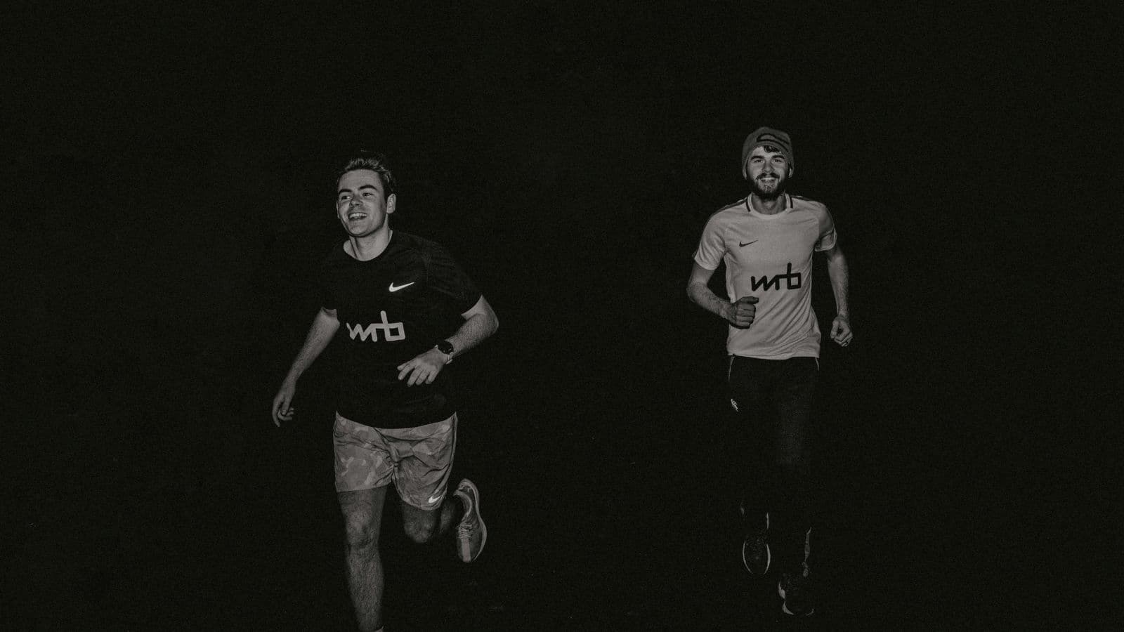 trail runner preparing for back to back trail races with race gear and structured training plan
