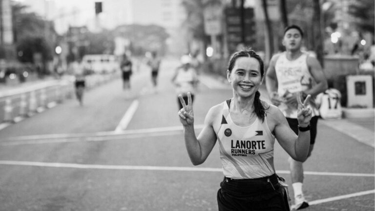 woman runner monitoring training schedule alongside menstrual cycle to optimize performance