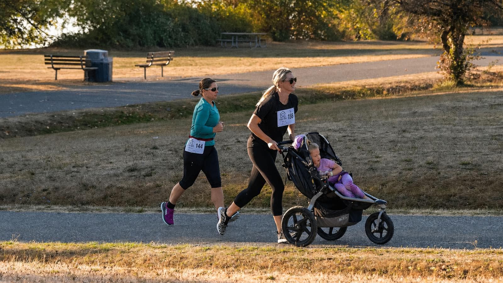 new mother jogging on trail while rebuilding fitness and endurance after pregnancy