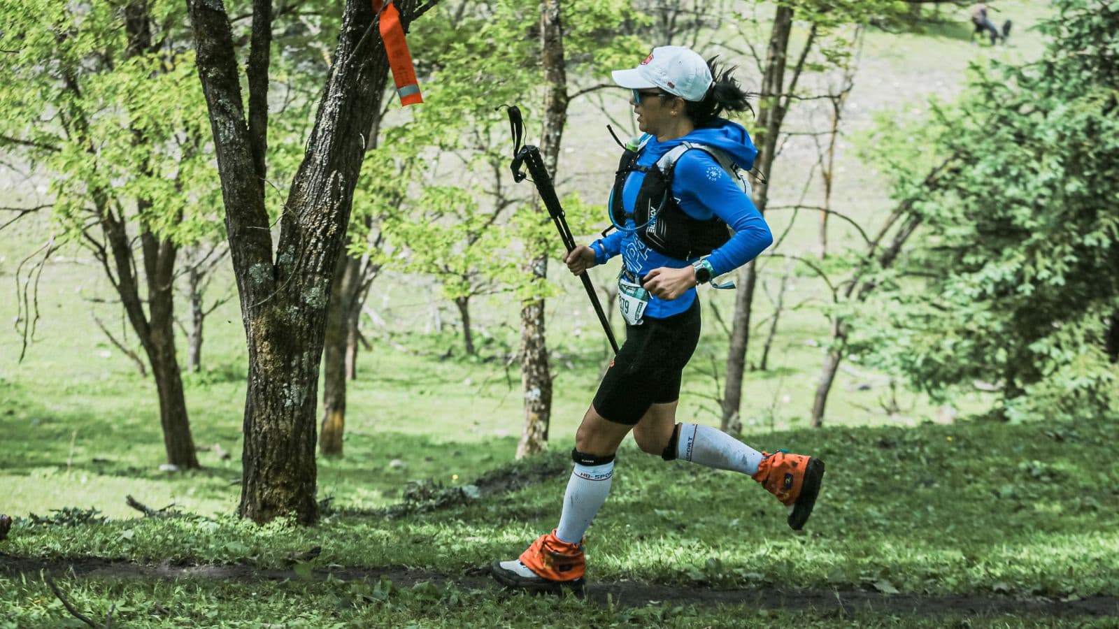Trail runner completing a steady training run on scenic trails as part of a consistent weekly running routine.