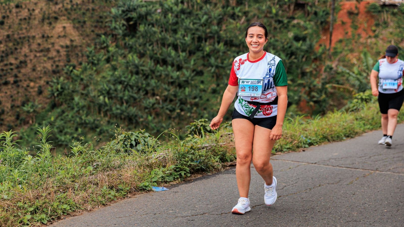 Trail runner enjoying a peaceful run through a forest surrounded by nature to improve mental wellbeing and reduce stress.