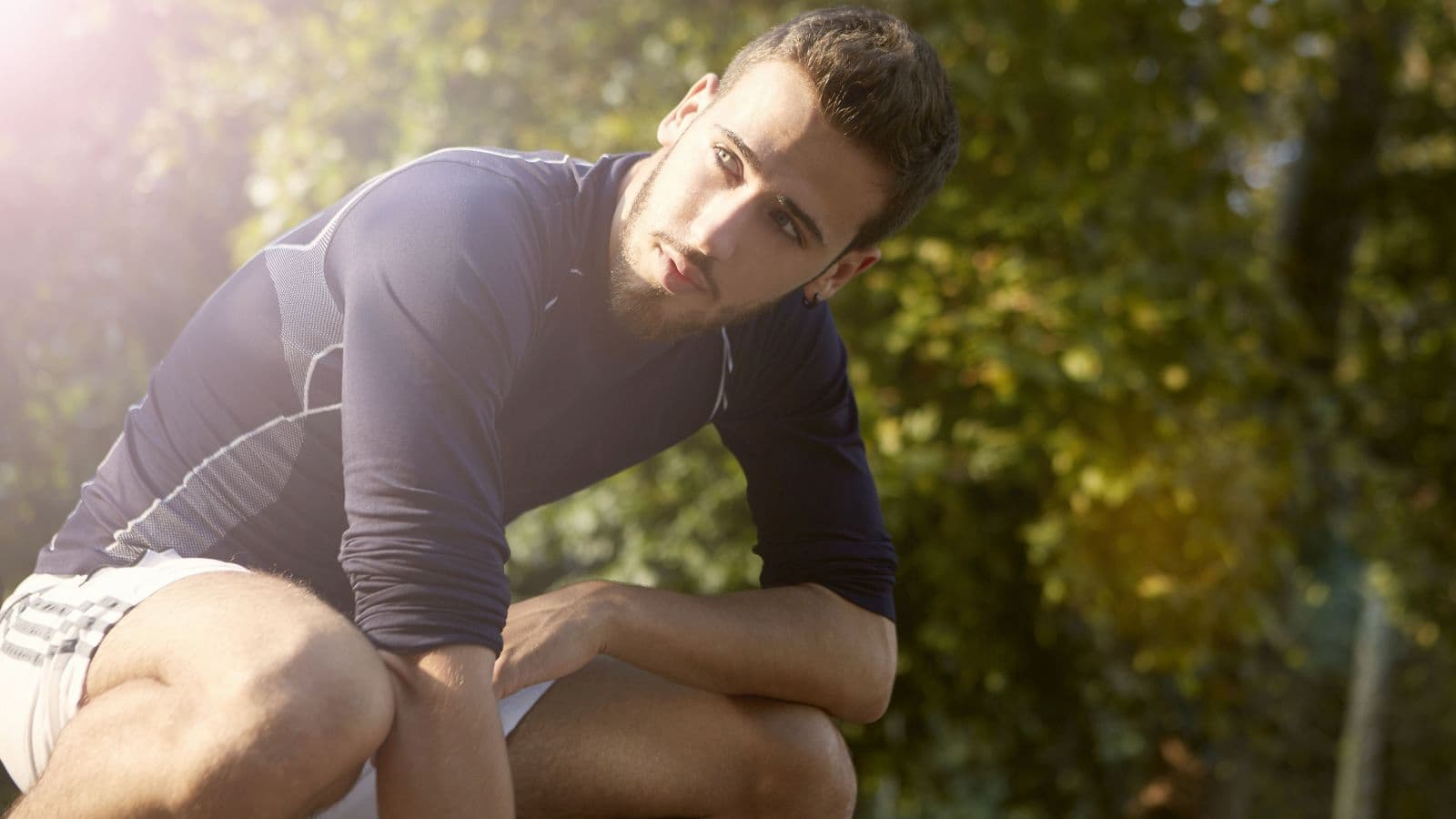 Trail runner reflecting on their recovery journey while preparing to return to training after a running injury.