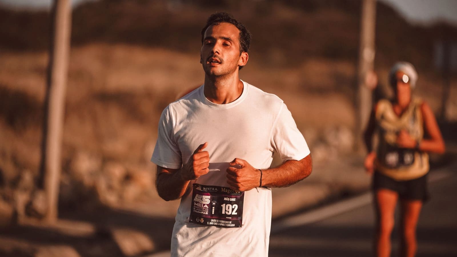 runner practicing light training and feeling exhausted due to sickness