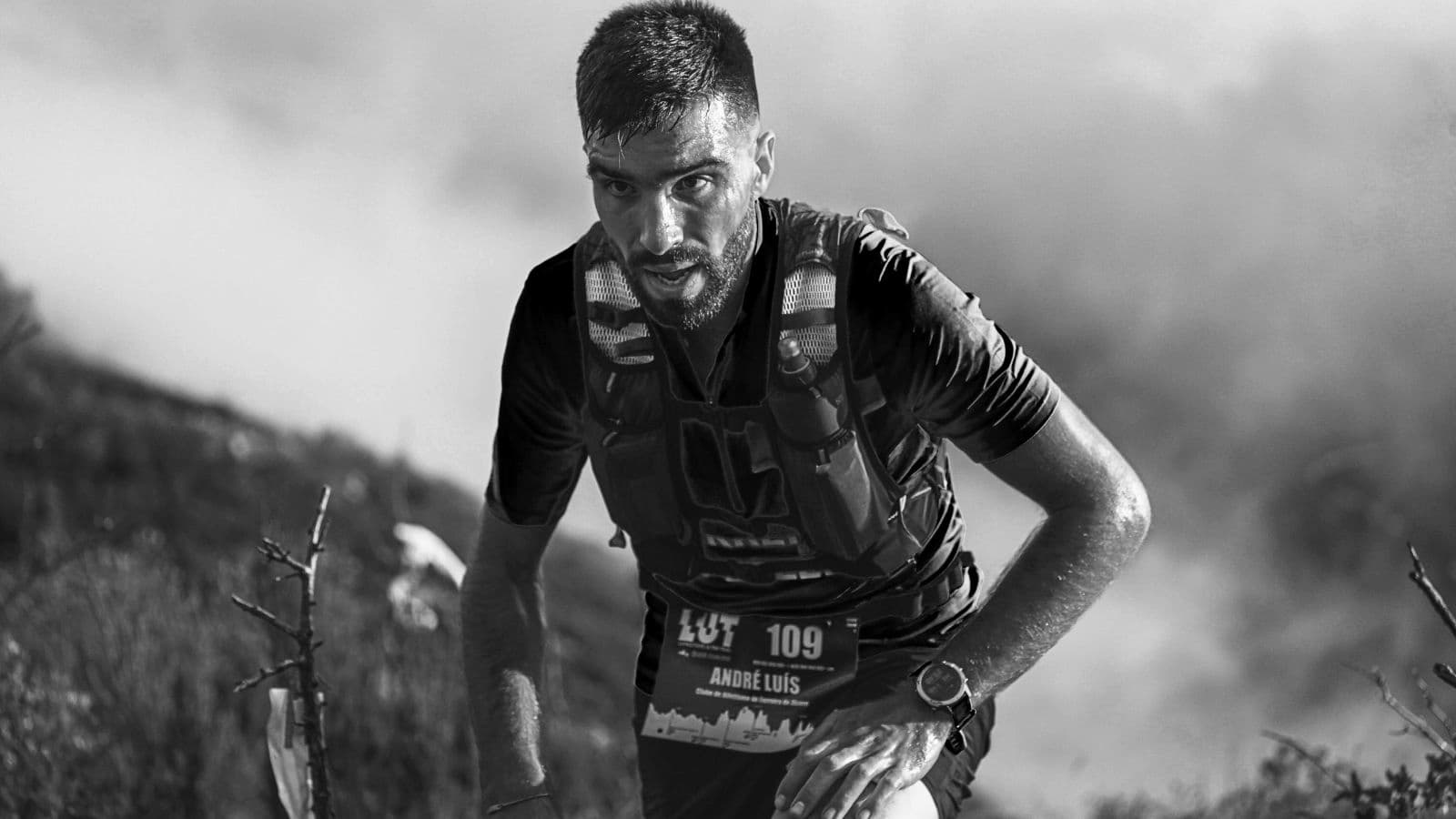 Marathon runner maintaining a controlled and sustainable pace during the early stages of a long-distance road race.