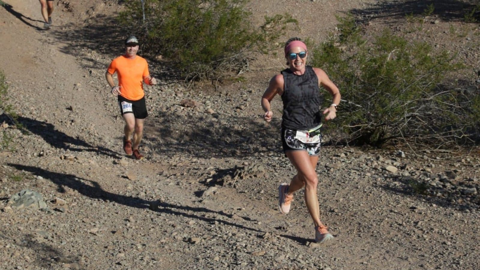 Trail runner completing a steady training run on a forest trail as part of a consistent weekly running routine.