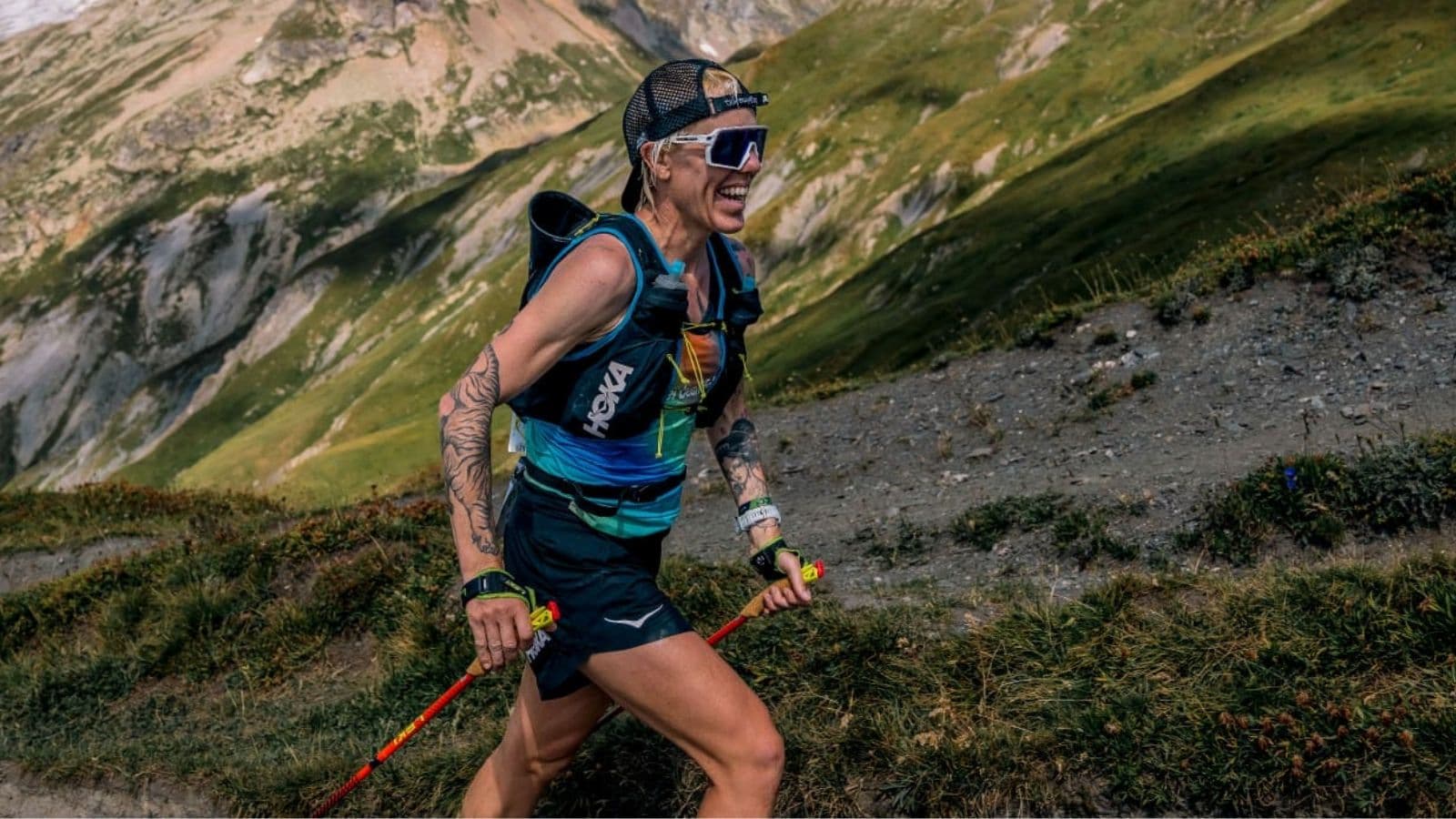 Trail runner enjoying a scenic mountain trail while working toward personal goals beyond improving race speed.