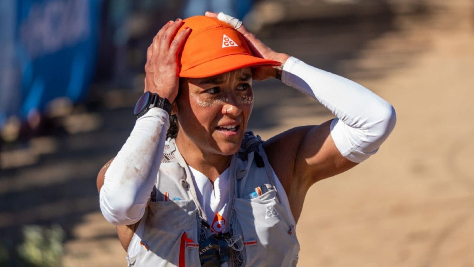Marathon runner feeling extremely exhausted & defeated near the finish line