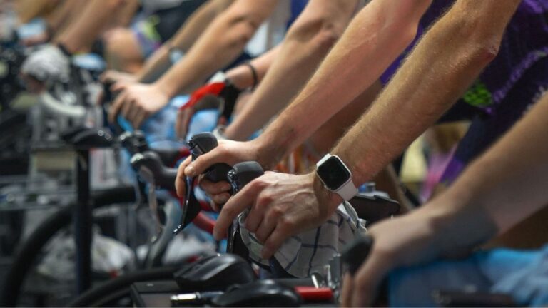 Runners completing an indoor cycling workout as cross training while using training time and intensity to estimate running mileage.