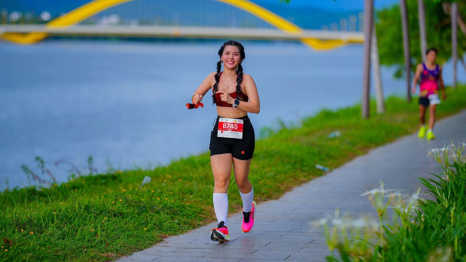 Distance runner completing a controlled faster-paced workout to improve running speed and overall performance.