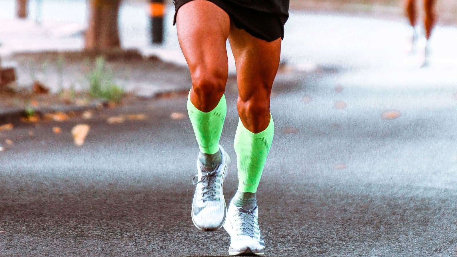 Distance runner completing a high-mileage training week after rapidly increasing running volume and workout intensity.