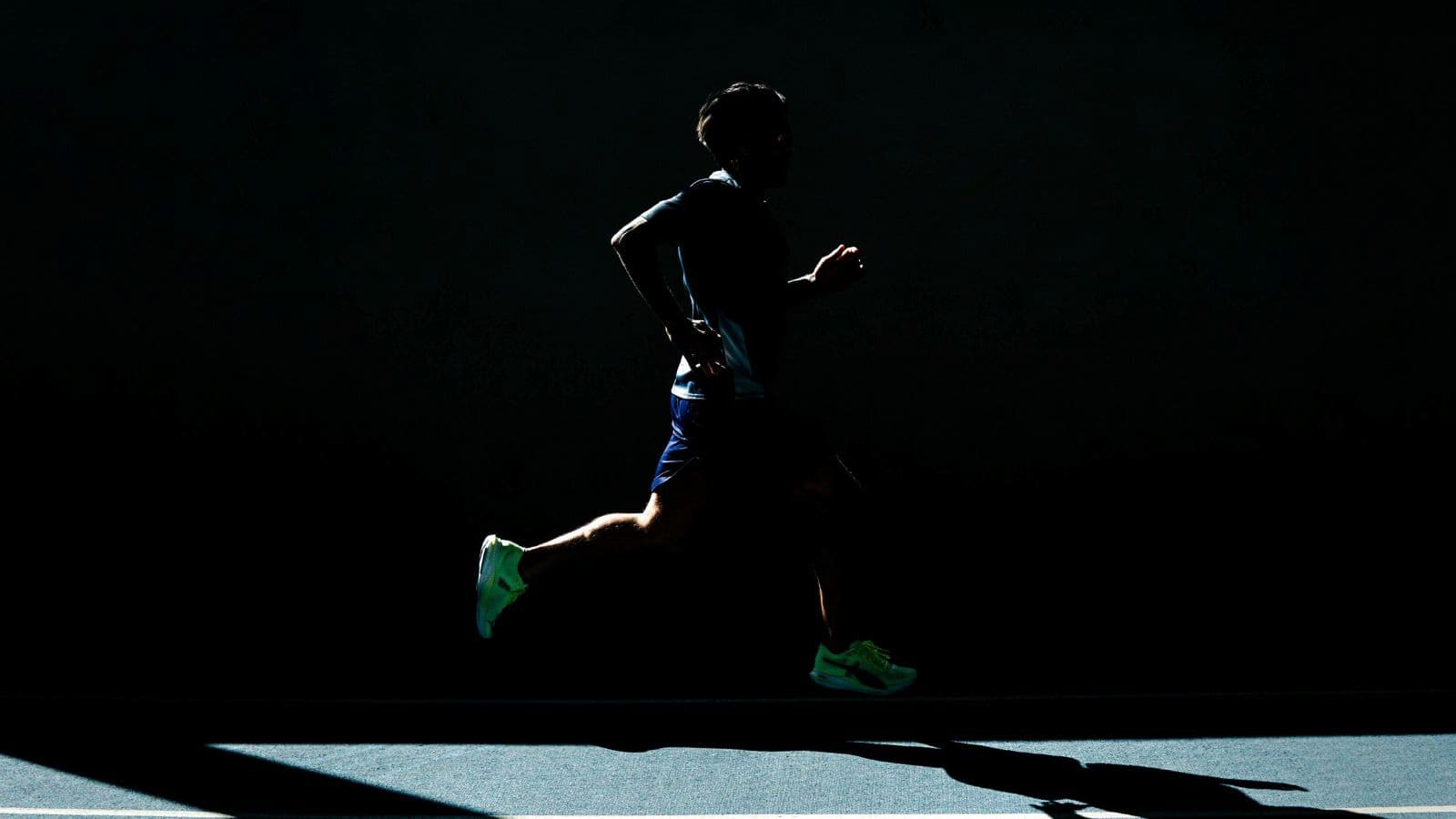 Runner completing a faster training session in the late afternoon when body temperature and physical readiness may be higher.